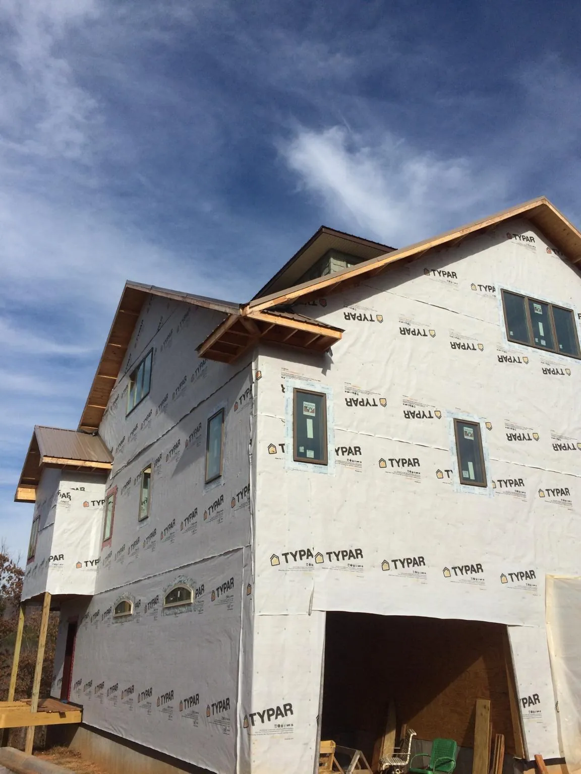 Stick built house wrapped in Typar with new roof framing and dormers in Eggleston